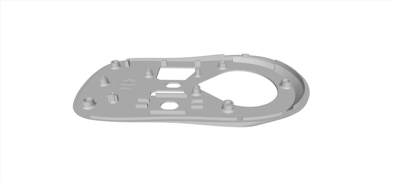 May include: A gray plastic mouse base with a circular cutout for the mouse sensor. The base has several small holes and a rectangular cutout for the mouse buttons.
