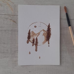 Hand-painted mountain landscape with coffee