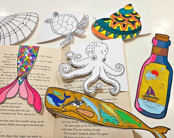 May include: A set of ten colorful bookmarks featuring various sea creatures, including a mermaid, an octopus, a turtle, a whale, and a seashell. The bookmarks are printed on white cardstock and are ready to be cut out and used.