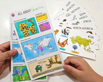 May include: Educational printables featuring colorful illustrations and text about cheetahs and world geography. The "All About Cheetah" page includes drawings and facts. Additional pages highlight continents and animals. The pages are held together with a pink push pin.