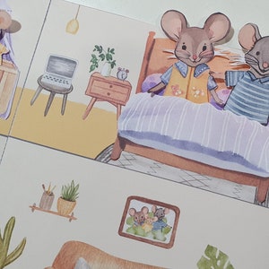 May include: Two brown mice wearing striped and patterned shirts are in bed together. The bed has a purple and white striped blanket. The mice are smiling and looking at the viewer. There is a nightstand with a lamp and a cup on it.