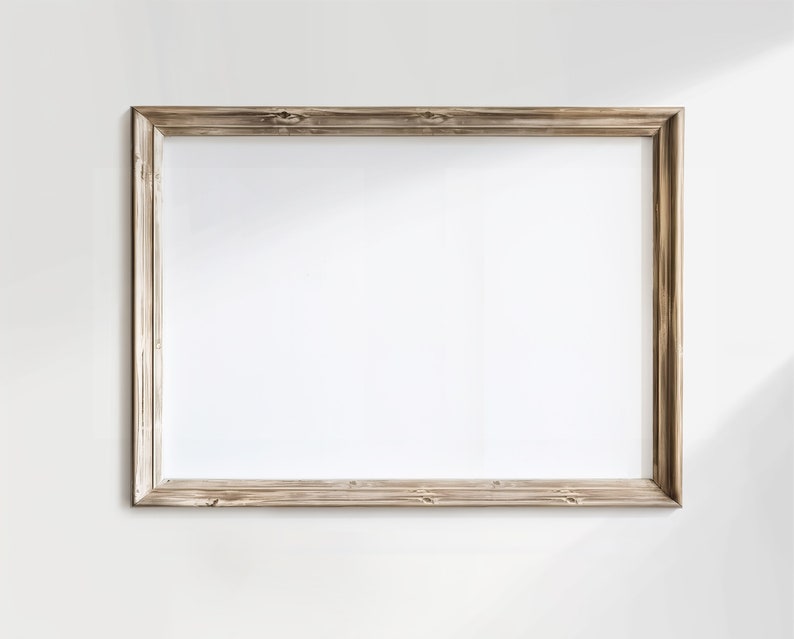 Op de afbeelding: Een eenvoudige, rechthoekige houten fotolijst met een lichtbruine afwerking. De lijst is leeg en klaar om te worden gevuld met een foto of kunstwerk.