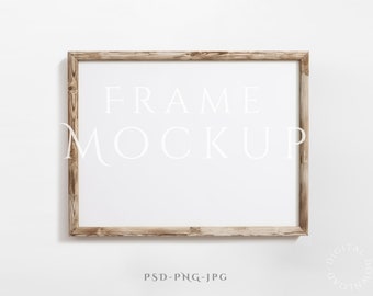 May include: A brown wooden frame with a white background. The text "FRAME MOCKUP" is written in white on the frame. The text "PSD-PNG-JPG" is written in white at the bottom of the image.