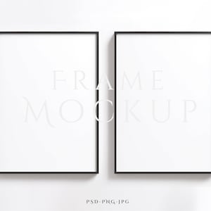 May include: Two black picture frames with white mats, side by side against a white wall. The frames are empty and ready for a photo or artwork.