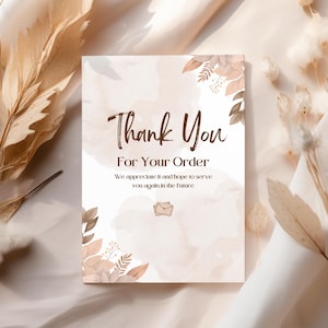 May include: A thank you card with a watercolor background and floral accents. The card says "Thank You For Your Order. We appreciate it and hope to serve you again in the future."