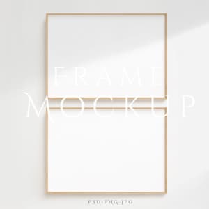 May include: A mockup of a gold frame with the text "FRAME MOCKUP" printed on the frame.