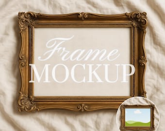 May include: A gold-colored, ornate picture frame with the words "Frame MOCKUP" in white script. The frame has detailed carvings and a rectangular shape. A smaller framed image is in the lower right corner. The image is on a beige fabric background.