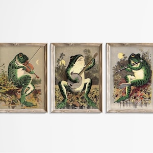 May include: Three vintage illustrations of frogs playing musical instruments. The first frog plays a violin, the second plays a banjo, and the third plays a flute. The illustrations are in a rustic style with a green, brown, and white color scheme.