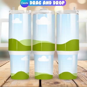 May include: Three stainless steel tumblers with a white lid and handle. The tumblers feature a design of rolling green hills and a blue sky with white clouds.