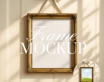 May include: A gold ornate picture frame mockup with the text "Frame Mockup" in white script. The frame is suspended by a cream-colored ribbon tied in a bow. A smaller framed image is in the lower right corner. The background is a cream-colored wall.