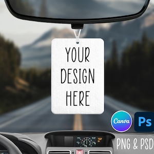 May include: White car air freshener with the text "YOUR DESIGN HERE" hanging from the rearview mirror of a car. The car is driving on a road with mountains in the background. The image includes the logos for Canva and Photoshop, and the text "PNG & PSD".