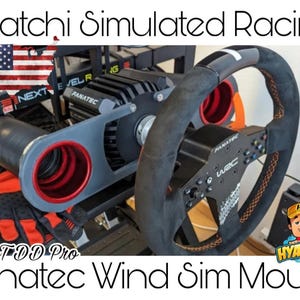 May include: A black Fanatec racing wheel with orange accents mounted on a gray metal frame. The frame has a red and black GT DD Pro logo. The wheel is attached to a black and gray Fanatec Wind Sim Mount.