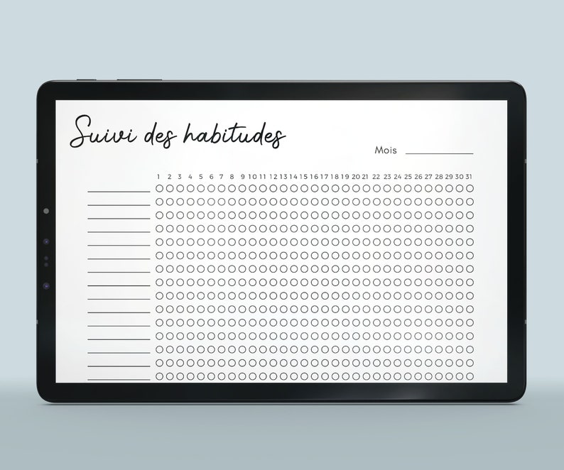 May include: A digital tablet displaying a habit tracker with the French words "Suivi des habitudes" and "Mois" at the top. The tracker has 30 columns representing days of the month and 10 rows for different habits. Each day is represented by a circle that can be filled in to indicate completion of a habit.