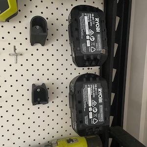 Ryobi 18v Battery mount - Pegboard mounted (STL file for 3D printing)