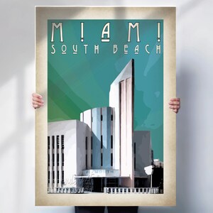 May include: A vintage-style poster featuring a stylized illustration of a building in Miami, Florida. The poster has a teal and green background with the words "MIAMI! SOUTH BEACH" in bold, art deco-style lettering. The building is white with blue accents.