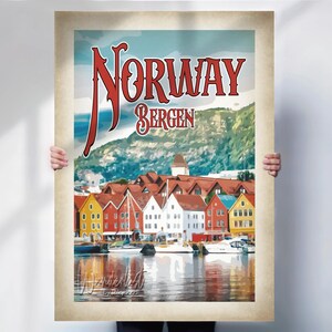May include: A vintage travel poster for Norway, featuring the city of Bergen. The poster displays colorful buildings along a waterfront, with the text "NORWAY BERGEN" in red. A mountain range and blue sky are in the background.