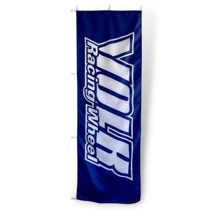 May include: A blue banner with white text that reads "YOLR Racing Wheel".