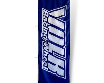 May include: A blue banner with white text that reads "YOLR Racing Wheel".