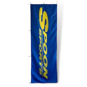 May include: A blue banner with the yellow text "SPOON SPORTS" in a vertical orientation.