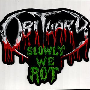 May include: A black patch featuring the word "OBITUARY" in white, with red blood dripping down. Below, the words "SLOWLY WE ROT" are in green, stylized lettering. The patch has a jagged, irregular shape.