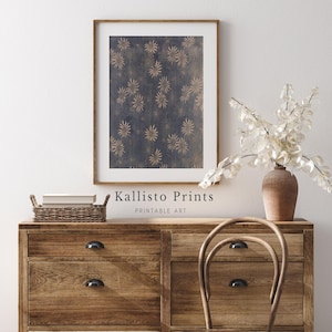 May include: A framed vertical wall art print featuring a dark navy blue background with a repeating pattern of light beige, star-shaped floral motifs. The text Kallisto Prints PRINTABLE ART is centered below the frame on the wall.