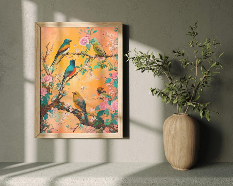 May include: A framed print of a colorful painting featuring five birds perched on a flowering branch. The birds are blue, green, and yellow with black markings. The flowers are pink and white. The background is a soft orange.