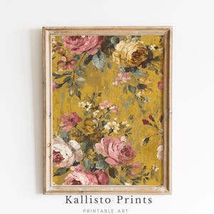 May include: A framed floral print featuring a vibrant arrangement of pink and yellow roses against a textured mustard-colored background. The artwork is in a distressed, vintage style, with the text "Kallisto Prints" at the bottom.