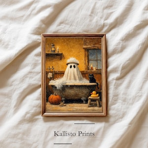 May include: A framed artwork depicts a ghost in a bathtub with bubbles, a black cat, and a rubber duck. A small pumpkin sits on the floor. The artwork is in a wooden frame and has a vintage aesthetic. The text "Kallisto Prints" is at the bottom.