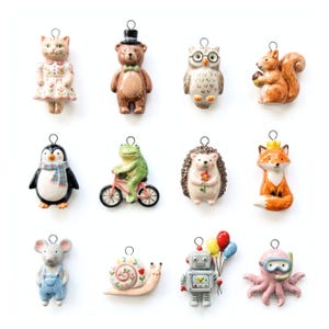 May include: A collection of twelve ceramic animal and character ornaments with metal loops for hanging. Figures include a cat in a floral dress, a bear with a top hat, an owl with glasses, a squirrel, a penguin, a frog on a bicycle, a hedgehog, a fox, a mouse, a snail, a robot with balloons, and an octopus with a snorkel.