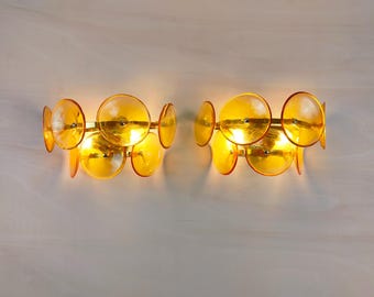 Pair of Murano glass wall sconces with amber Trumpets