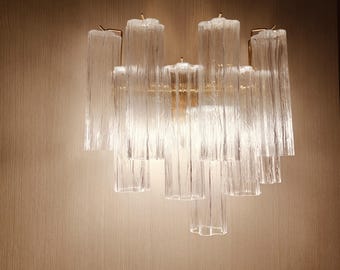 Murano glass wall sconce tronchi in clear glass and polished gold metal frame