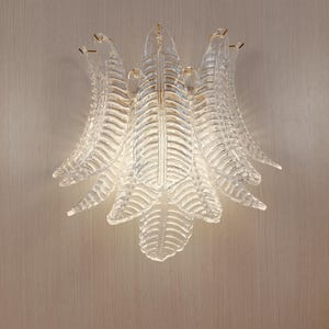 Murano glass wall sconce with clear glass leaves and polished gold metal frame