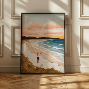 May include: A painting of a woman standing on a beach with her arms outstretched. The sky is a soft pink and blue with the words "Empowered Here" written in the clouds. The beach is white sand with blue water and green trees in the background.