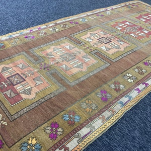 Large Hand-Knotted Wool Turkish Rug: 6.9x11.4 ft, Tribal Vintage Design