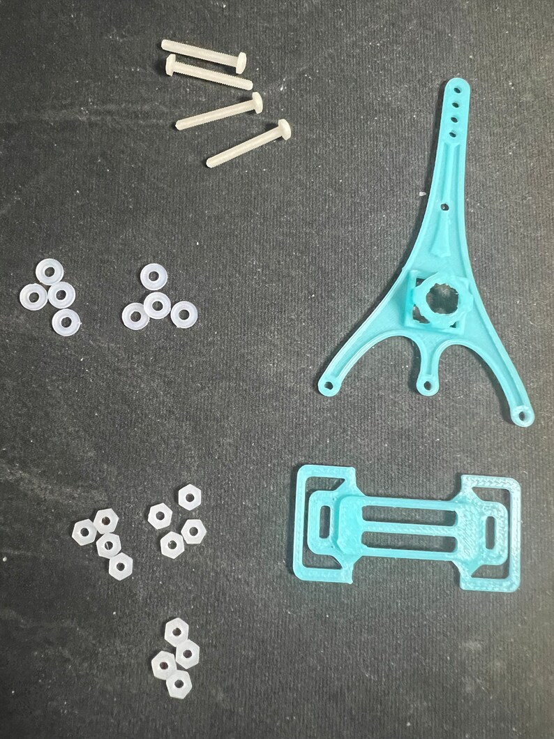 Kit parts Tier 2 for a 2 inch 1 S build on rotor builds. TPU stack HW. Battery strap and canopy for toothpick or whoop quadcopter. image 1