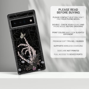 May include: Black phone case with a skeleton hand reaching out to a butterfly on a spiderweb background. The case has a floral design with black, white, and pink flowers. The text "PLEASE READ BEFORE BUYING" is printed on the right side of the image.
