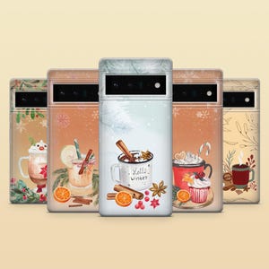 May include: Five smartphone cases featuring winter-themed illustrations of mugs with hot beverages, cinnamon sticks, orange slices, and berries. The center case displays a white mug with the text Hello Winter, surrounded by cinnamon and star anise.
