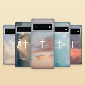 May include: A collection of five phone cases featuring a white cross design. Each case displays a different sky scene, including clouds and sunsets. The cases are clear, allowing the sky backgrounds to be visible.