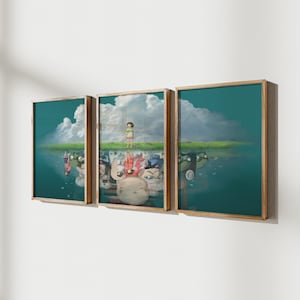 May include: A three-piece framed art print set featuring a whimsical illustration of a young girl standing in a field with a reflection of a group of fantastical creatures in the water below. The prints are framed in a light wood frame.