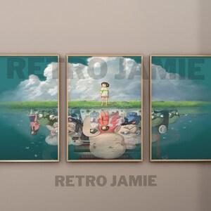 May include: A three-piece set of framed prints featuring a scene from the animated film "Spirited Away". The prints are set against a light beige wall. The prints feature a teal background with a scene of a young girl standing on a grassy hill with a reflection of the scene in the water below. The text "RETRO JAMIE" is printed below the prints.