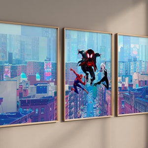 May include: Three Spider-Man characters, including Miles Morales, are shown in a cityscape setting. The characters are in mid-air, swinging from webs. The background is a colorful cityscape with buildings and streets.