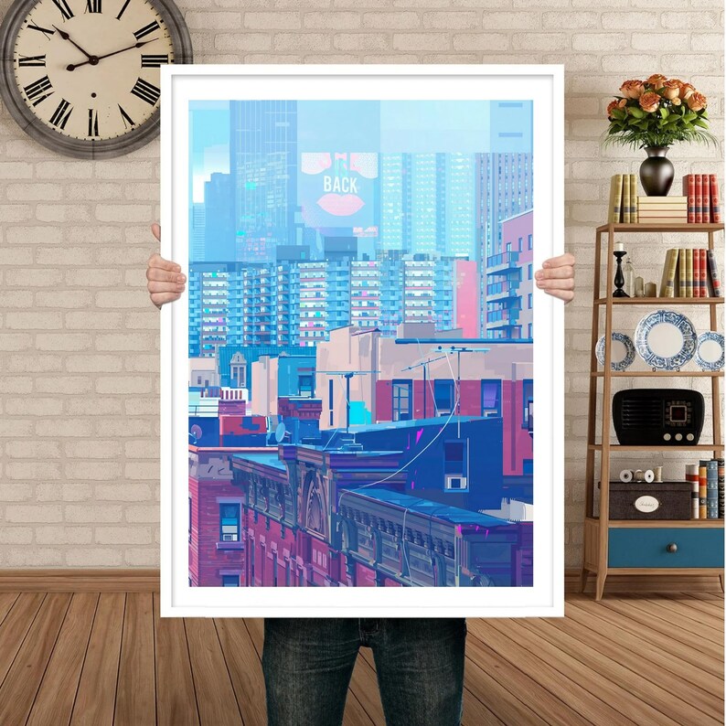 May include: A framed print of a cityscape with a blue and purple color scheme. The buildings are stacked on top of each other and the sky is a light blue. The text "IM BACK" is visible on a billboard in the distance.