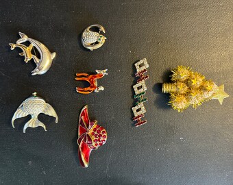 Lot of 7 Brooches: Angel Fish, Red Hat, Pony, Cat on the Moon, 2 Christmas Pins