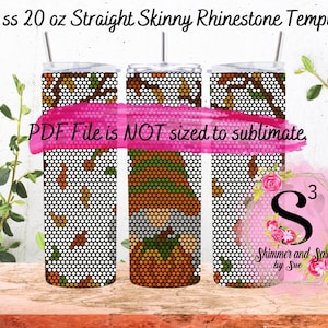 May include: Three 20 ounce straight skinny tumblers with a fall-themed rhinestone design. The tumblers are on a wooden surface with greenery in the background. The text "PDF File is NOT sized to sublimate." is displayed on the image. The image also includes a logo for "Shimmer and Sass by Sue".