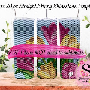 May include: Three 20 ounce straight skinny tumblers with a rhinestone template design. The design features pink, yellow, and green flowers on a blue background. The text "PDF File is NOT sized to sublimate." is printed on a pink banner across the bottom of the image. The text "Shimmer and Sass by Sue" is printed on a pink circle with a white outline.