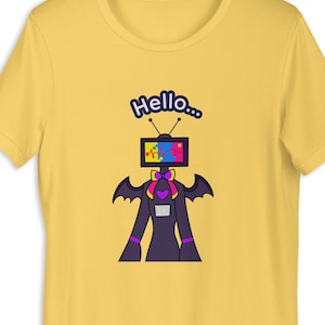 May include: Yellow t-shirt featuring a cartoon robot with a TV screen head. The screen displays colorful pixelated graphics. The robot has bat-like wings and a bow tie. The word "Hello..." is above the robot's head.