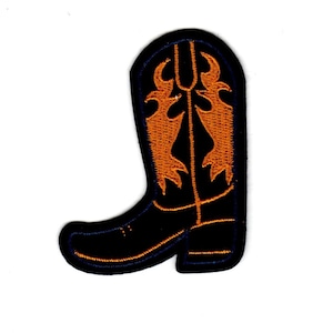 May include: Black cowboy boot with orange flame design embroidered on the shaft.