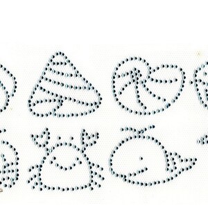 May include: A set of eight iron-on rhinestone designs featuring various sea creatures and shells. The designs are in a light blue color and are perfect for adding a touch of sparkle to clothing, bags, or other accessories.