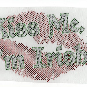 May include: Red and green rhinestone iron-on patch with the words "Kiss Me I'm Irish" in silver rhinestones.