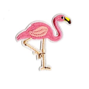 May include: Pink flamingo embroidered iron-on patch. The flamingo is standing on one leg with its head turned to the side. The patch has a white background.